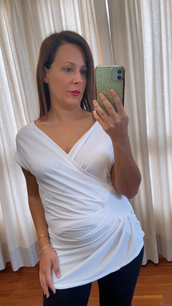 Blusa entrelazada blanca